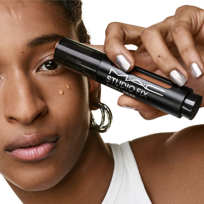 Model with MAC Cosmetics product.